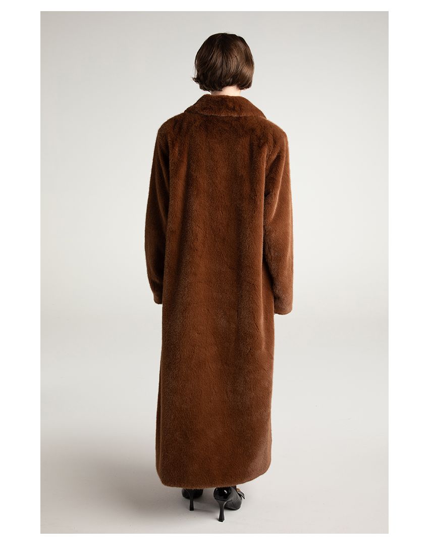 Vintage atmosphere teddy bear and fur long coat